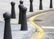 protective street bollards next to road
