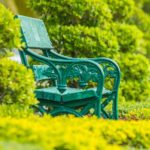 green metal and wood park bench