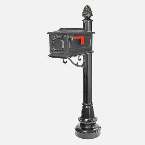 Single cast aluminum mailbox unit on round pole with decorative bracket and acorn finial. Brandon Industries model FAC46-2194-3X.