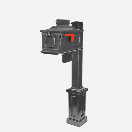 Single cast aluminum mailbox unit on round pole with address plaque and end cap finial. Brandon Industries model FEQ46-ANQ4-1X.
