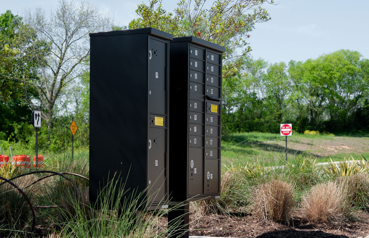 Mail and Parcel A cluster box unit near a residential road