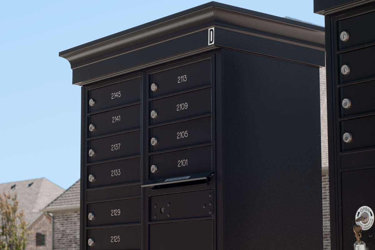 Cluster boxes for mail and parcel delivery in apartment complexes A cluster mailbox unit (CBU)