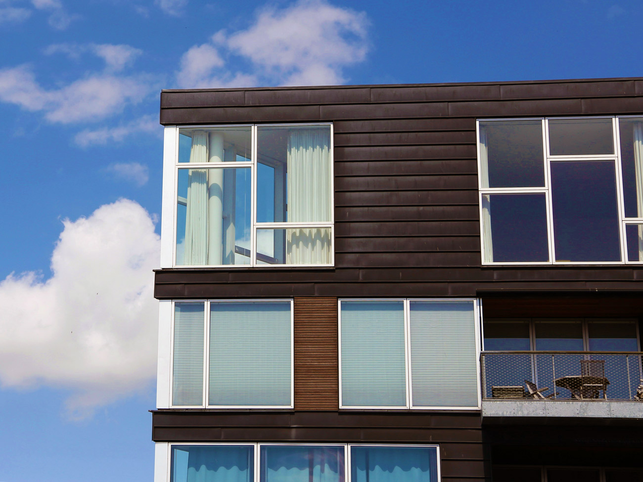 Optimize tenant experience with upgraded streetscape fixtures Photo of an apartment building