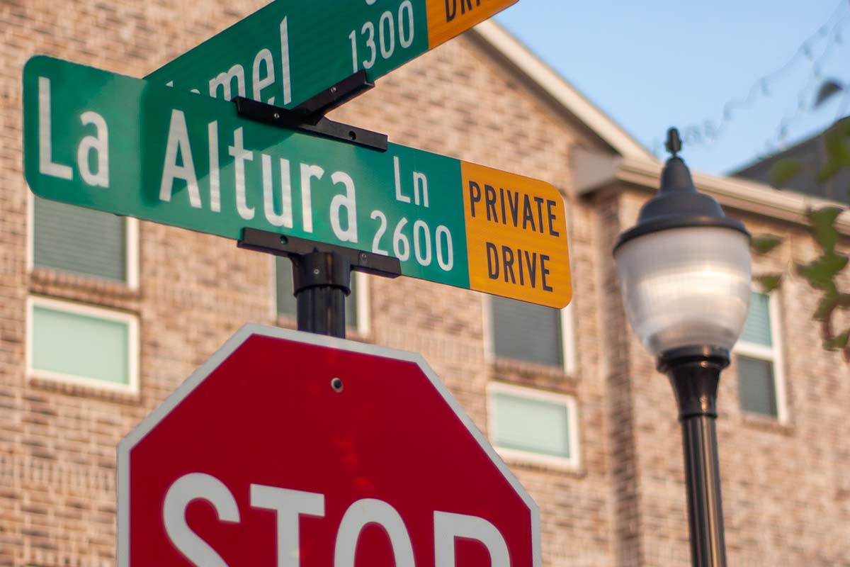 Deliver the right message with street and directional signs A street sign at an intersection in an apartment complex