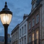 A photo of a classic lamp post in a historical urban district