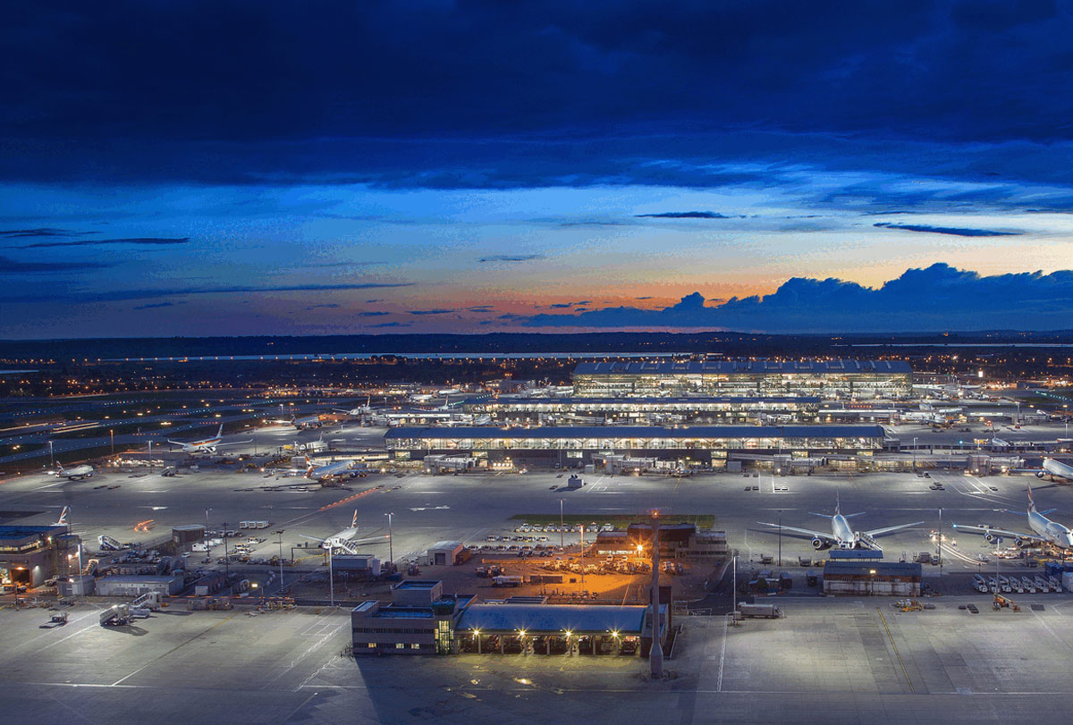 A Brilliant New Partnership An aerial photo of Heathrow Airport after dark, illuminated by C.U. Phosco high mast lighting.